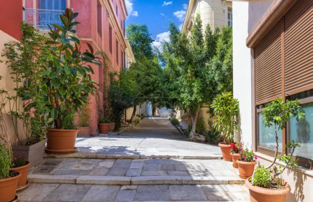 Photo for Greece, historic neighborhood of Plaka and Anafiotika in Athens with restaurants near Acropolis. - Royalty Free Image