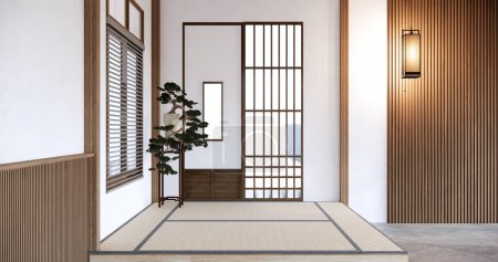 Foto de Habitación vacía de estilo japonés decorada con pared blanca y pared de listones de madera - Imagen libre de derechos