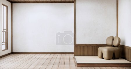 Foto de Sofá sillón en sala de estar japonesa con pared vacía. - Imagen libre de derechos