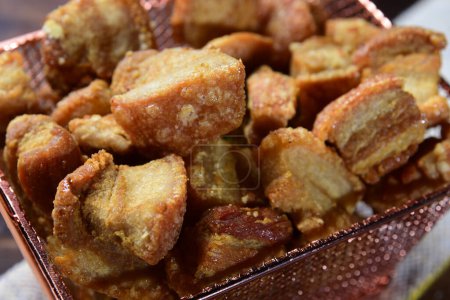 Photo for Pork crackling fried and crispy pururuca typical Brazilian food - Royalty Free Image