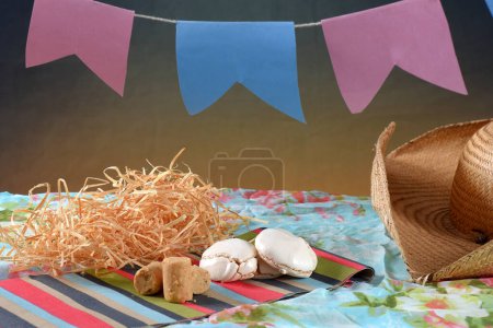 Photo for Festa Junina party background with peanuts and traditional sweets. Brazilian summer harvest festival concept. flags and typical foods - Royalty Free Image