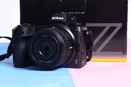 Photo for Goiania, Brazil 09 July 2023: Nikon Z6 II (version 2) camera photograph confrontation and competition between cameras. White background. The best mirrorless cameras from top brands. - Royalty Free Image