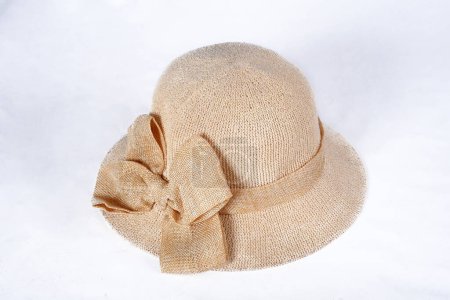 Photo for Golden capim hat brazilian handicraft natural straw wide brimmed hat isolated on white background head protection style - Royalty Free Image