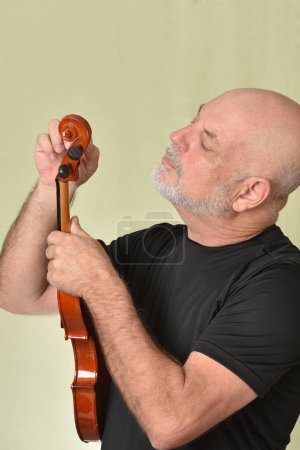 music adult man with violin string instrument played in orchestra classical music song
