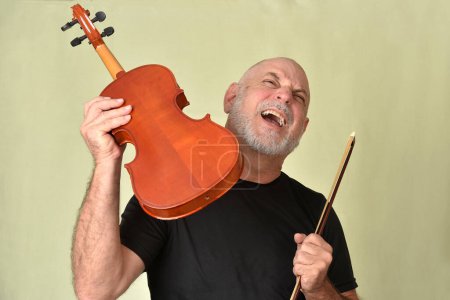 music adult man with violin string instrument played in orchestra classical music song