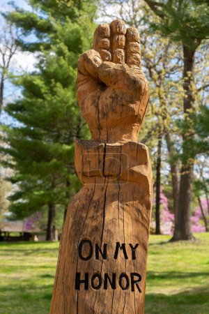Photo for Oglesby, Illinois - United States - April 26th, 2023: Boy Scout carving at Starved Rock State Park on a beautiful Spring morning. - Royalty Free Image
