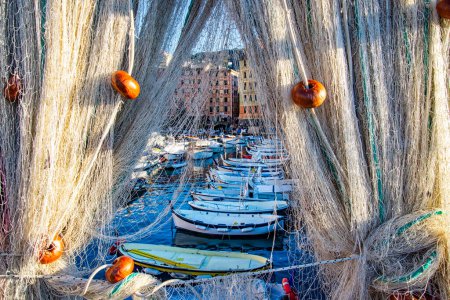 Photo for Fishing net close-up with Camogli houses in background - Royalty Free Image