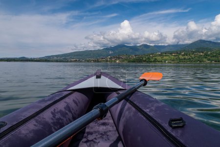 Canoeing scene on Lake Pusiano