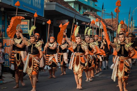 Photo for Yogyakarta, 27 may 2023; cultural parade in Kotagede with traditional jaranan clothes - Royalty Free Image