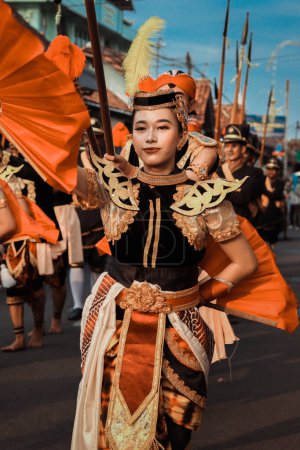 Photo for Yogyakarta, 27 may 2023; cultural parade in Kotagede with traditional jaranan clothes - Royalty Free Image