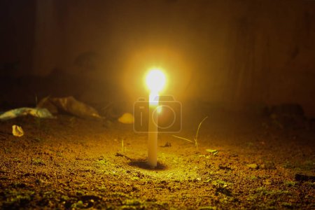 Photo for Burning candle in the night - Royalty Free Image