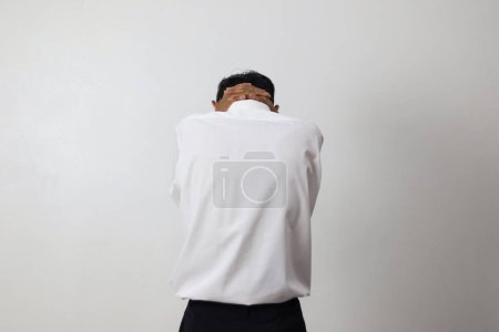 Photo for Young man with his neck pain on white background. - Royalty Free Image