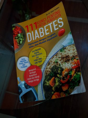 Photo for Lampung, Indonesia - 27th November. 2023: Closeup of diabetes recipe book on table - Royalty Free Image