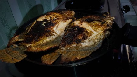 Grilled carp on pan