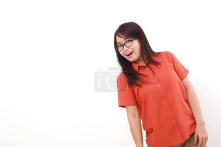 Photo for Wow expression of young asian woman standing with peeking gesture. Isolated on white - Royalty Free Image