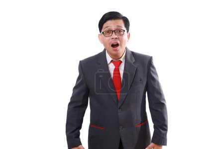 Photo for Wow shocked asian businessman standing with surprised face expression. Isolated on white - Royalty Free Image