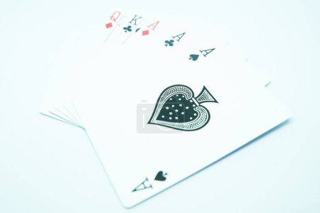 Photo for Three of kind, with three of A"s , king and queen in poker game - Royalty Free Image
