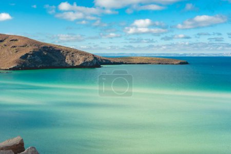 Photo for Playa Balandra (Balandra Beach) is a beach located on the Baja California Sur peninsula of Mexico in La Paz. The water is very shallow, allowing visitors to walk across the bay to the other side, with a very beautiful view between mountains and rocks - Royalty Free Image