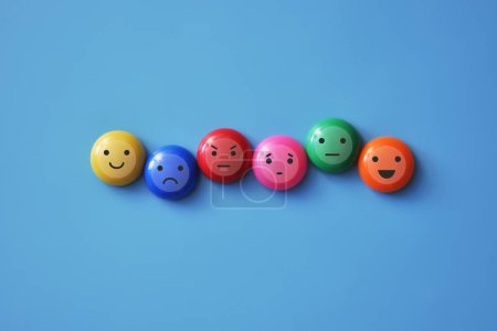 Photo for A variety of human emotions: joy, serenity, anger, sadness on colored balls - Royalty Free Image