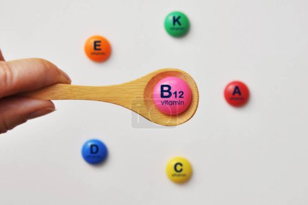 Photo for Vitamin B12 on a spoon. Food with a high content of vitamin B - Royalty Free Image
