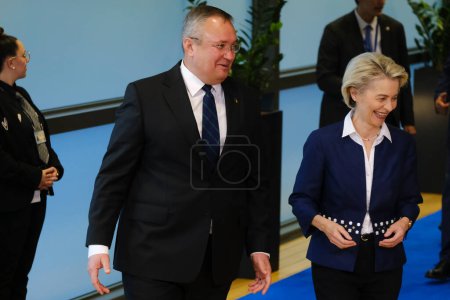 Photo for European Commission President Ursula von der Leyen greets Romania's Prime Minister Nicolae Ciuca at EU headquarters in Brussels, Belgium on Oct. 26, 2022. - Royalty Free Image