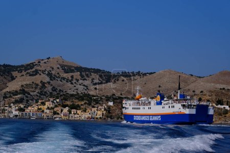 Photo for A passengers boat arrives in Symi, Greece on July 30, 2022. - Royalty Free Image