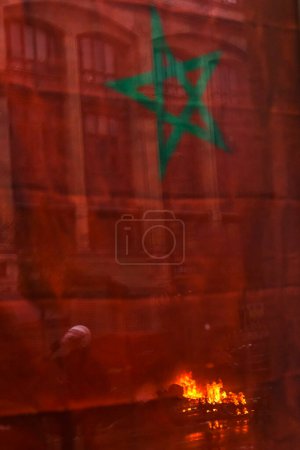 Photo for Fans of Morocco national team clashed with riot police after the Qatar 2022 World Cup football match between Belgium and Morocco, in Brussels, Belgium on November 27, 2022. - Royalty Free Image