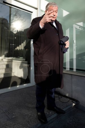 Photo for Member of the EU Parliament Marc Tarabella, leaves the headquarters of the Socialist Party after a committee following the allegations related to the Qatar case in Brussels, Belgium on Dec.13, 2022 - Royalty Free Image