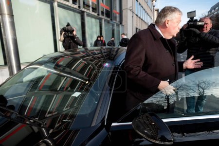 Photo for Member of the EU Parliament Marc Tarabella, leaves the headquarters of the Socialist Party after a committee following the allegations related to the Qatar case in Brussels, Belgium on Dec.13, 2022 - Royalty Free Image
