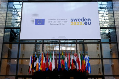 Foto de Brussels, Belgium. 17th January 2023. A view of a banner inside the EU Council marking the taking over of the rotating presidency of the European Council by Sweden. - Imagen libre de derechos