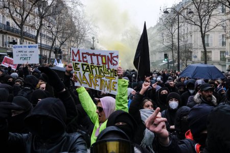 Photo for Protesters take part in a demonstration against the pension overhauls in Paris, France on January 19, 2023. - Royalty Free Image