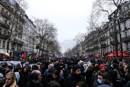 Photo for Protesters take part in a demonstration against the pension overhauls in Paris, France on January 19, 2023. - Royalty Free Image