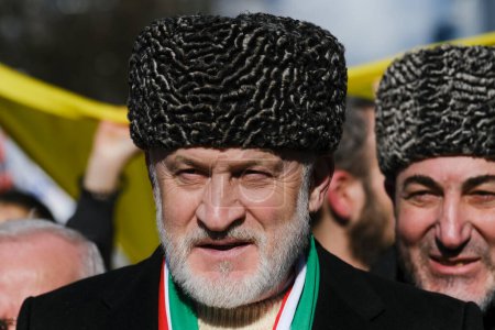 Photo for Akhmed Zakayev, Prime Minister of the Chechen Republic of Ichkeria government-in-exile during a demonstration for the first anniversary of the Russian invasion in Brussels, Belgium on Feb. 25, 2023. - Royalty Free Image