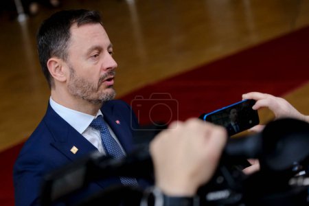Photo for Slovakia's Prime Minister Eduard Heger arrives for a EU Summit, at the EU headquarters in Brussels, on March 23, 2023. - Royalty Free Image