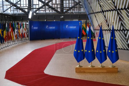 Photo for European  flags stand in EU Council building in Brussels, Belgium March 23, 2023. - Royalty Free Image