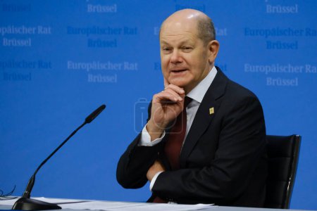 Photo for Germany's Chancellor Olaf Scholz speaks during a press conference after a EU Summit, at the EU headquarters in Brussels, on March 24, 2023. - Royalty Free Image