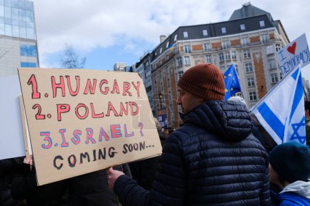 Photo for Israeli protesters demonstrate outside of the EU headquarters against the plans of Prime Minister Netanyahu's government to overhaul the judicial system in Brussels, Belgium on March 27, 202 - Royalty Free Image