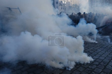 Photo for Riot police clashed with protestors during a demonstration in a national strike against government plans to revamp the pension system in central Paris, France on April 06, 2023. - Royalty Free Image
