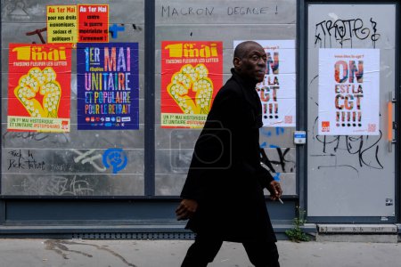 Photo for Protesters attending a demonstration in the annual May Day (Labour Day) rally, marking International Workers' Day, in Paris on May 1, 2023. - Royalty Free Image