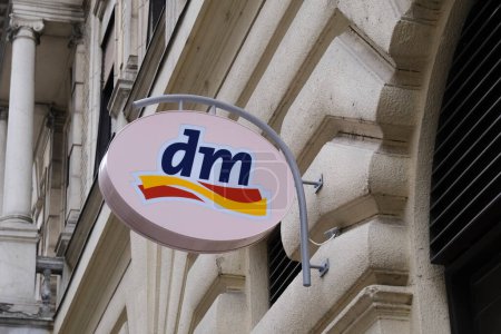 Photo for Logo of dm store. dm-drogerie markt is a chain of retail stores that sells cosmetics, healthcare and health food. Budapest, Hungary on Dec. 21, 2022. - Royalty Free Image