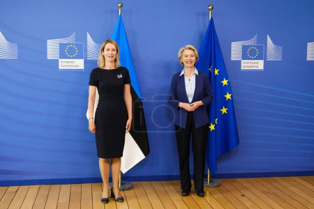 Photo for European Commission President Ursula von der Leyen, right, greets Estonia's Prime Minister Kaja Kallas prior to a meeting at EU headquarters in Brussels, Belgium on June 28, 2023. - Royalty Free Image