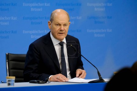 Photo for Germany's Chancellor Olaf Scholz gives a press statement on the results of a EU Summit, at the EU headquarters in Brussels, on June 30, 2023. - Royalty Free Image