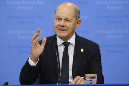Photo for Germany's Chancellor Olaf Scholz gives a press statement on the results of a EU Summit, at the EU headquarters in Brussels, on June 30, 2023. - Royalty Free Image
