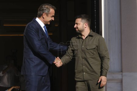 Photo for Greece's Prime Minister Kyriakos Mitsotakis welcomes Ukraine's President Volodymyr Zelenskyy at Maximos Mansion in Athens, Greece on Aug. 21, 2023. - Royalty Free Image