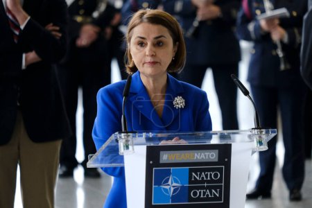 Photo for Luminita ODOBESCU, addresses the audience during a ceremony to mark the 75th anniversary of NATO at NATO headquarters in Brussels, Belgium on April 4, 2024 - Royalty Free Image