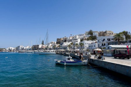 Photo for Leisure and fish boats docked i in greek island of Naxos, Greece on May 4, 2024. - Royalty Free Image