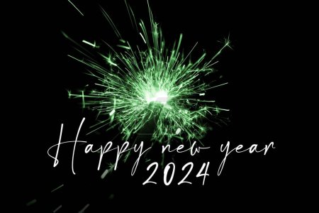 Photo for Happy new year 2024 green sparkler new years eve countdown. Luxury entertainment celebration turn of the year party time. Premium nightlife visual with glowing light sparks on dark background. - Royalty Free Image