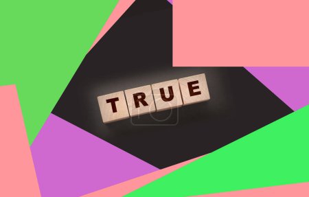 Photo for Concept word true on wooden cubes on black background. - Royalty Free Image