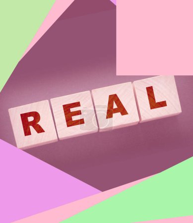 Photo for RENT word on wooden cubes on a pink lilac and beige. Real estate business concept. - Royalty Free Image