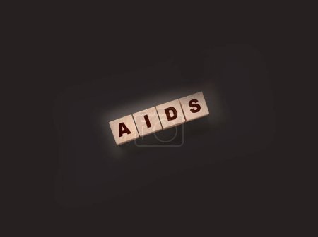 Foto de Abreviatura del SIDA escrita en cubos de madera. Concepto de salud. ETS enfermedades de transmisión sexual. - Imagen libre de derechos